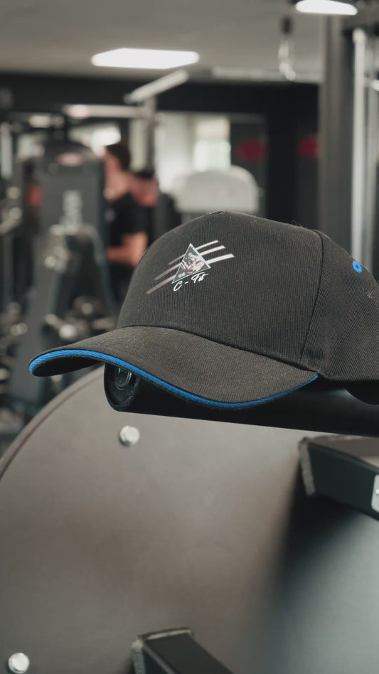 Casquette Noire Logo Stylisé – Style & Performance